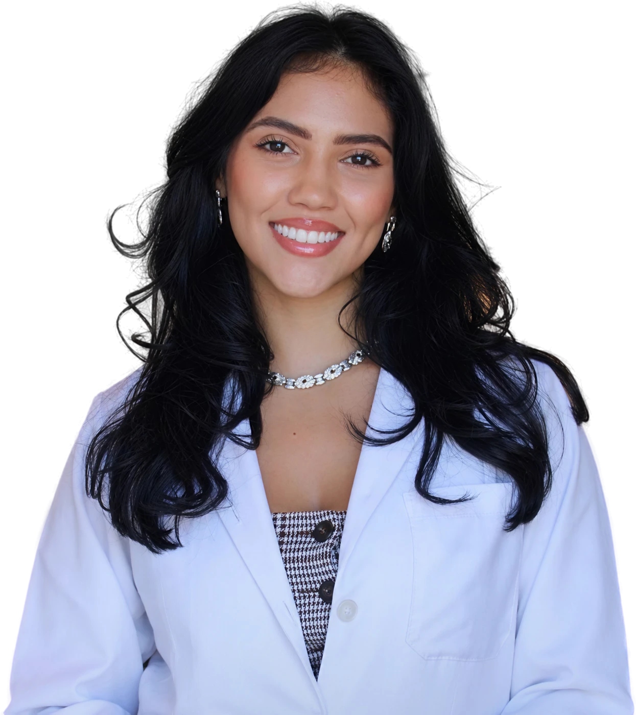 Nathalie Sales de jaleco, sorrindo